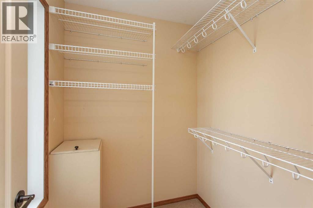 Walk-in closet with laundry shute