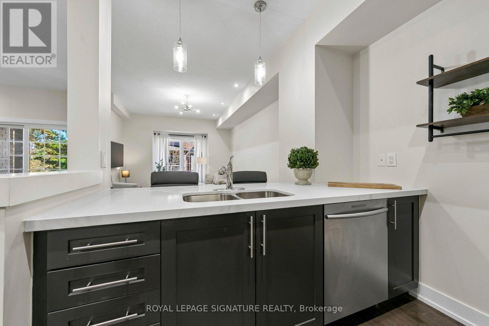 #105 1401 PLAINS ROAD E - 22