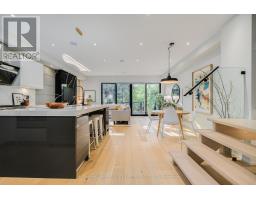 Family room - 70 Bellefair Avenue, Toronto, ON M4L3T8 Photo 7