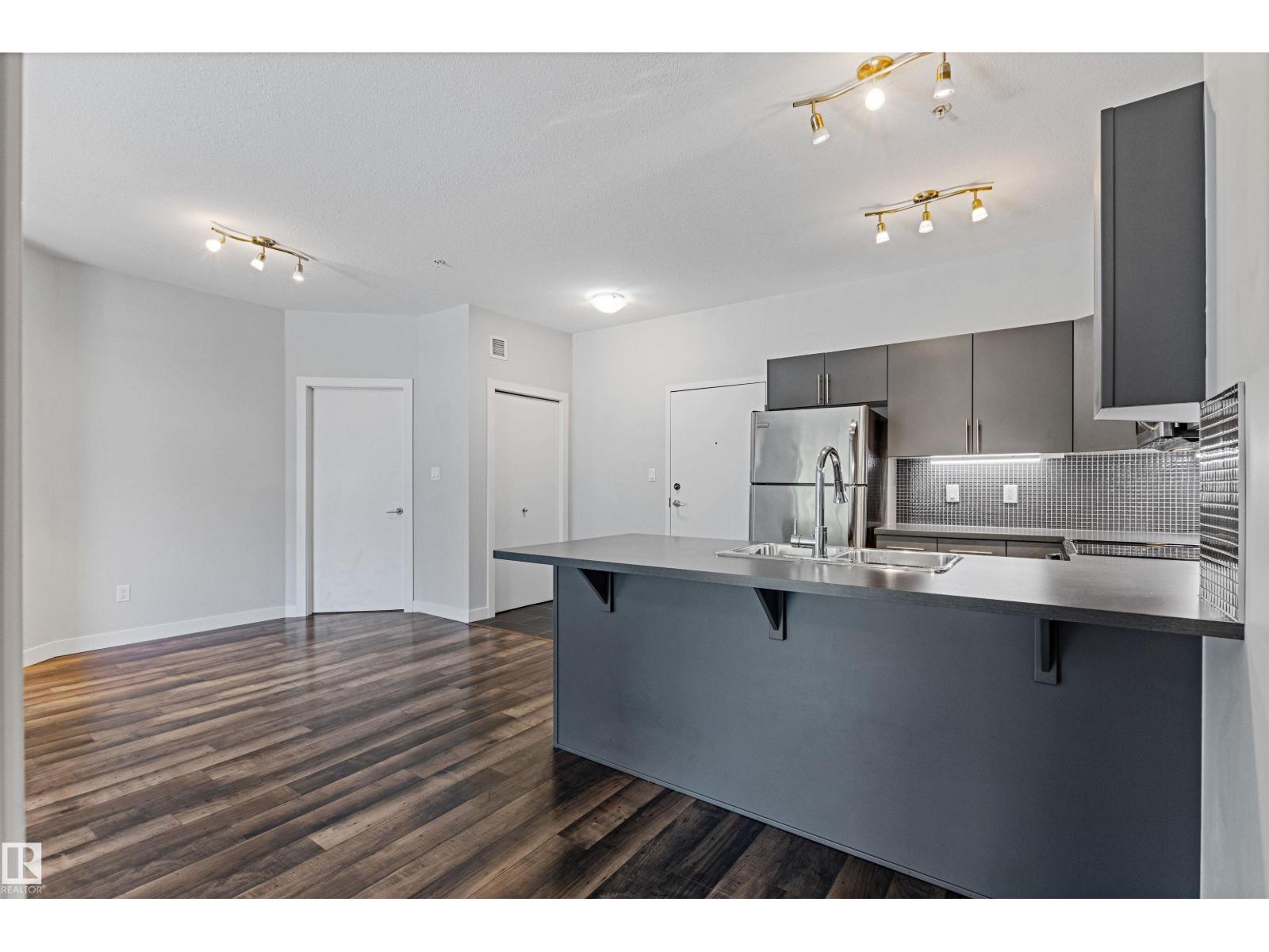 #210 10611 117 ST NW - 10