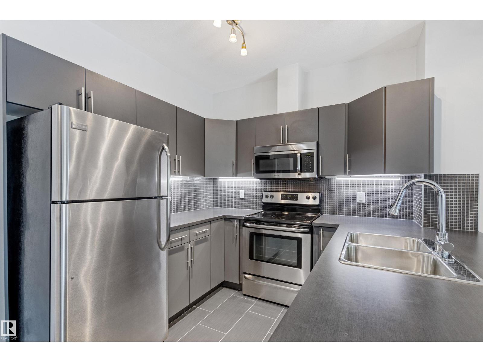 #210 10611 117 ST NW - 11