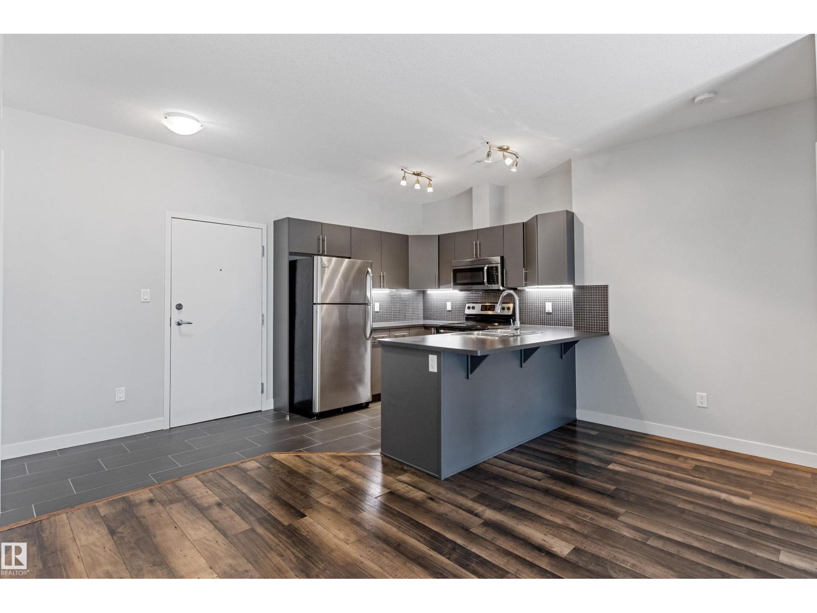 #210 10611 117 ST NW - 8