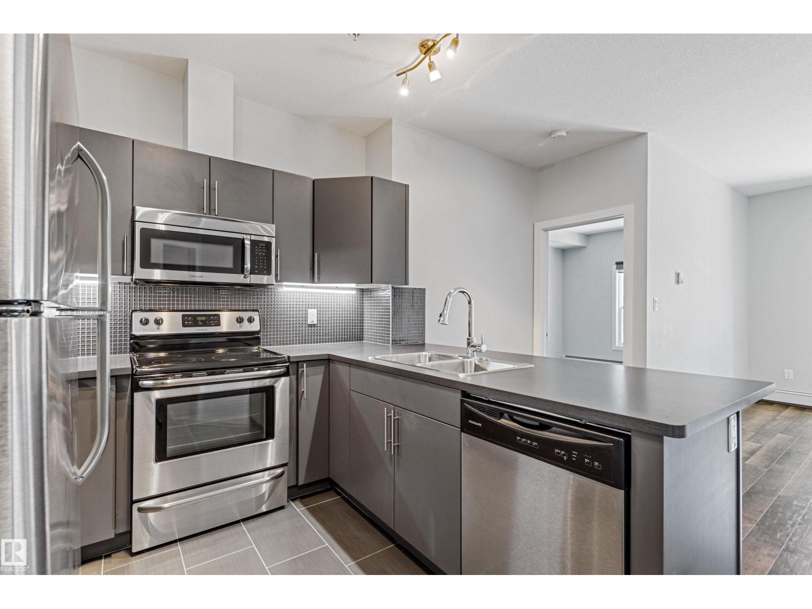 #210 10611 117 ST NW - 9
