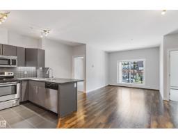 Laundry room - #210 10611 117 St Nw, Edmonton, AB T5H0G6 Photo 6