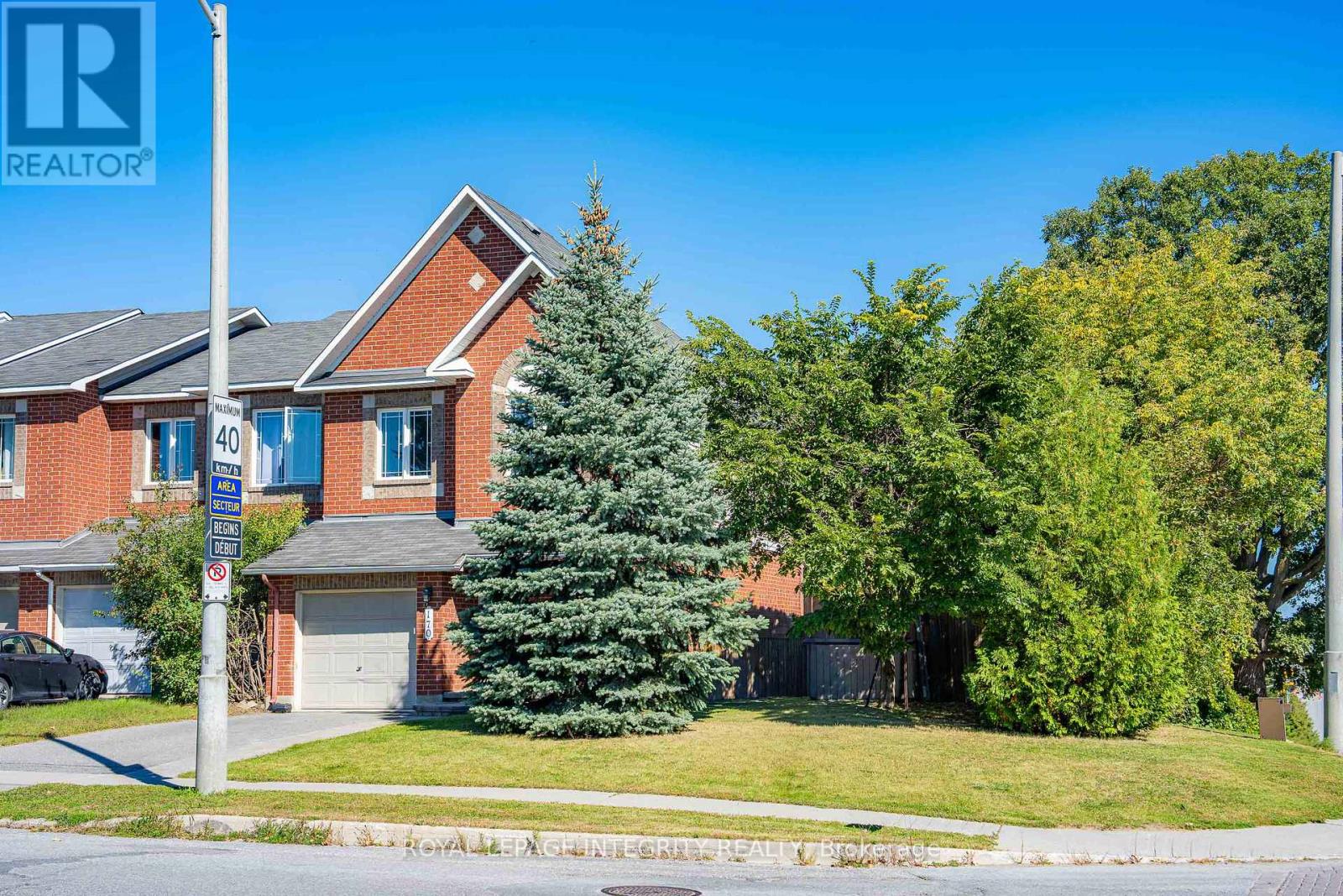 End-unit exterior with oversized side yard