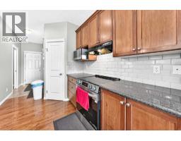 Living room - 316, 1 Glensummit Close Se, Cochrane, AB T4C2J9 Photo 8
