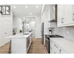 Primary Bedroom - 72 Wolf Hollow Villas Se, Calgary, AB T2X5K2 Photo 6