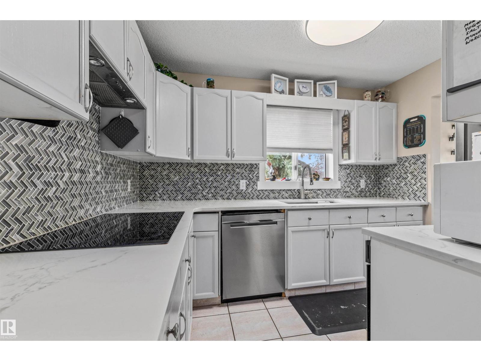 #63 501 YOUVILLE DR E NW - 4
