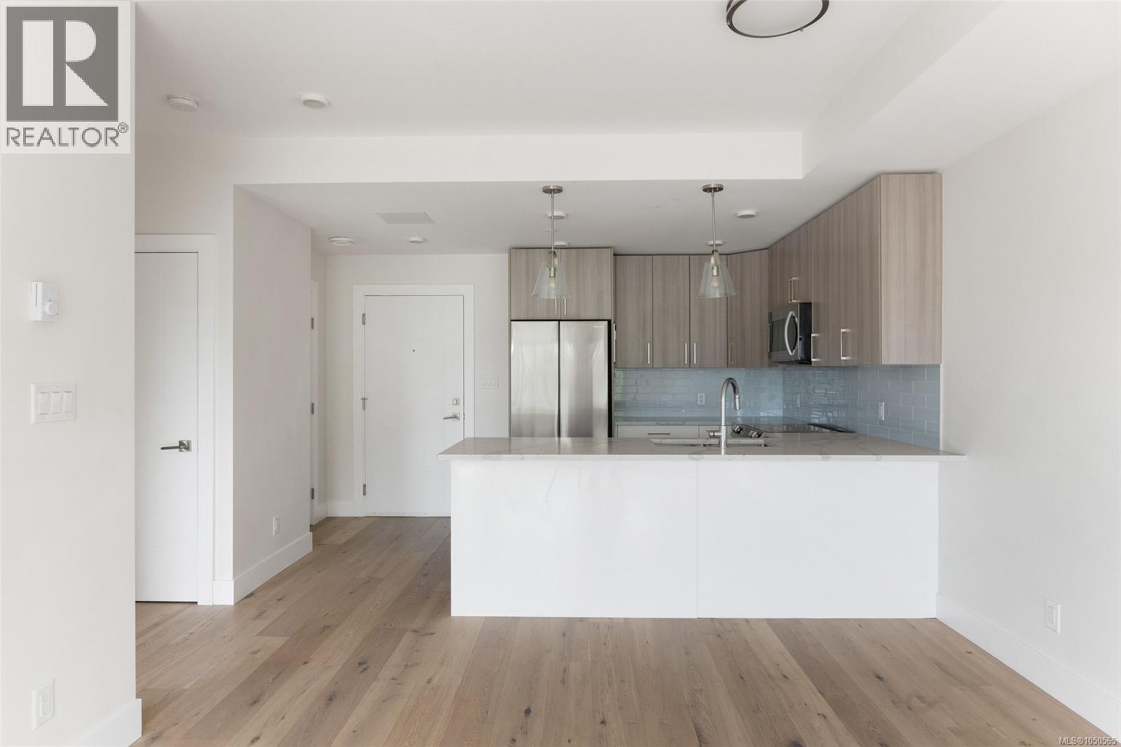 #306 7098 Wallace Dr - 7