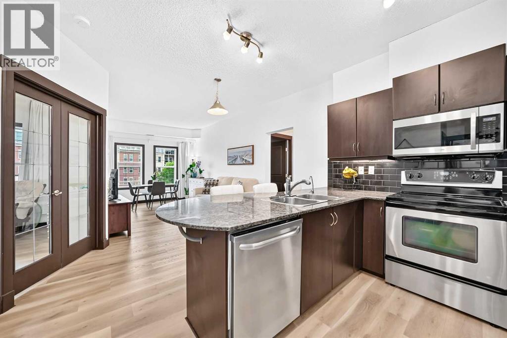 4203, 11811 Lake Fraser Drive SE - photo 3