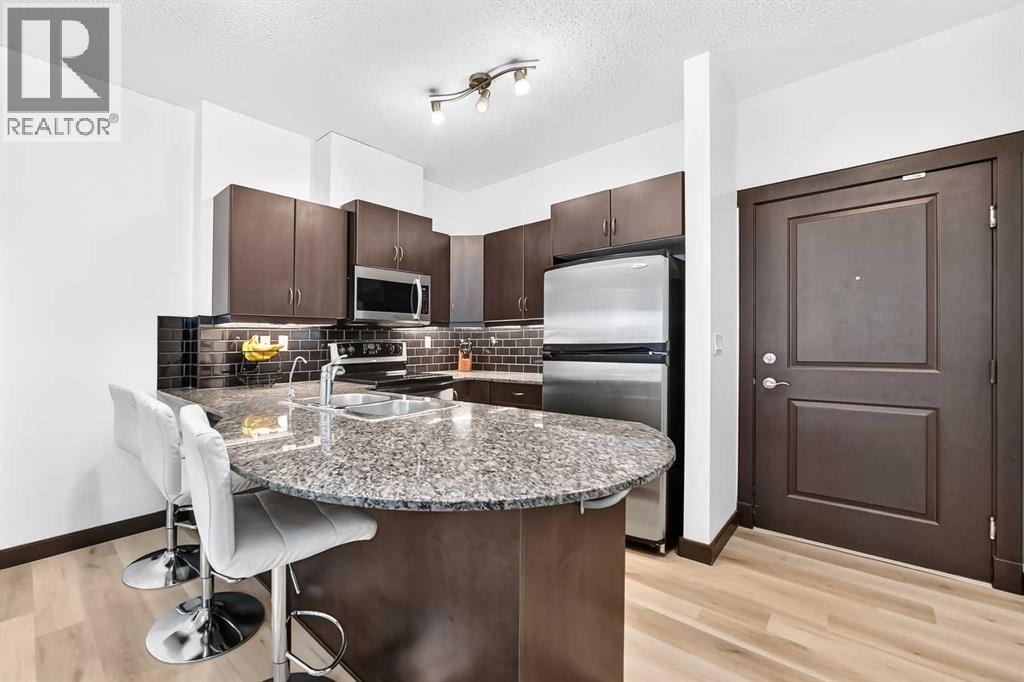 4203, 11811 Lake Fraser Drive SE - photo 5