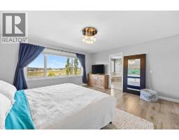 18 Hidden Creek Manor Nw, Calgary, AB T3A6L7 Photo 18