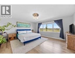 18 Hidden Creek Manor Nw, Calgary, AB T3A6L7 Photo 17