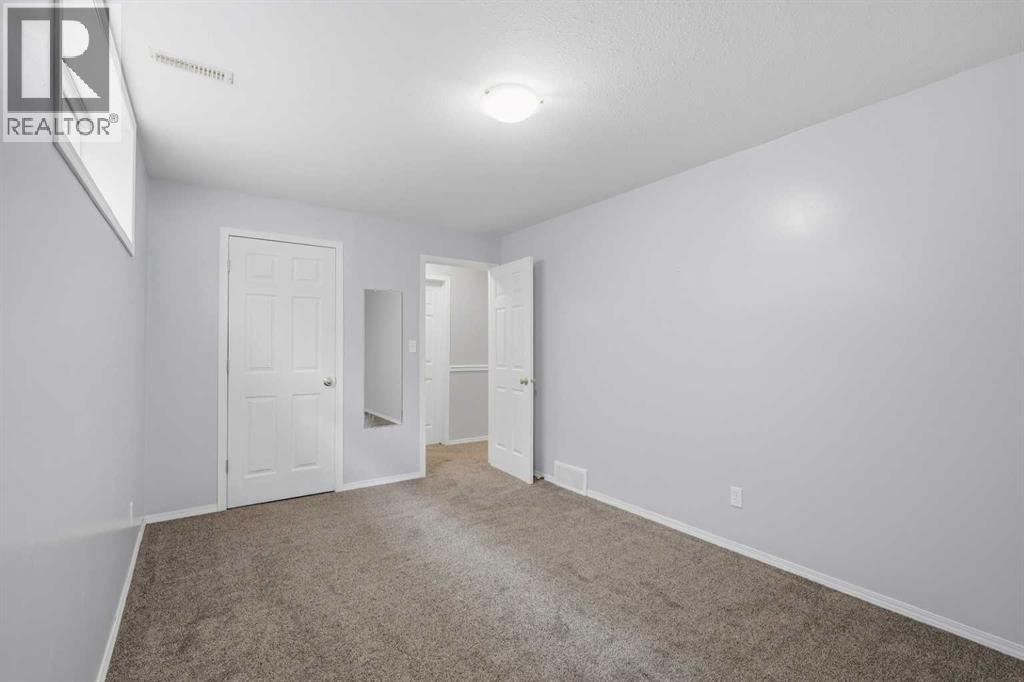 Listing photo – 142 Robinson, Penhold