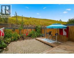 Laundry room - 12, 800 Bowcroft Place, Cochrane, AB T4C1B9 Photo 10
