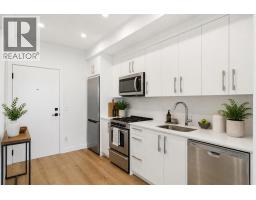 547, 110 18A Street NW - photo 2