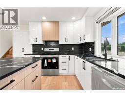 Family room - 702 Mckercher Drive, Saskatoon, SK S7H3W7 Photo 9