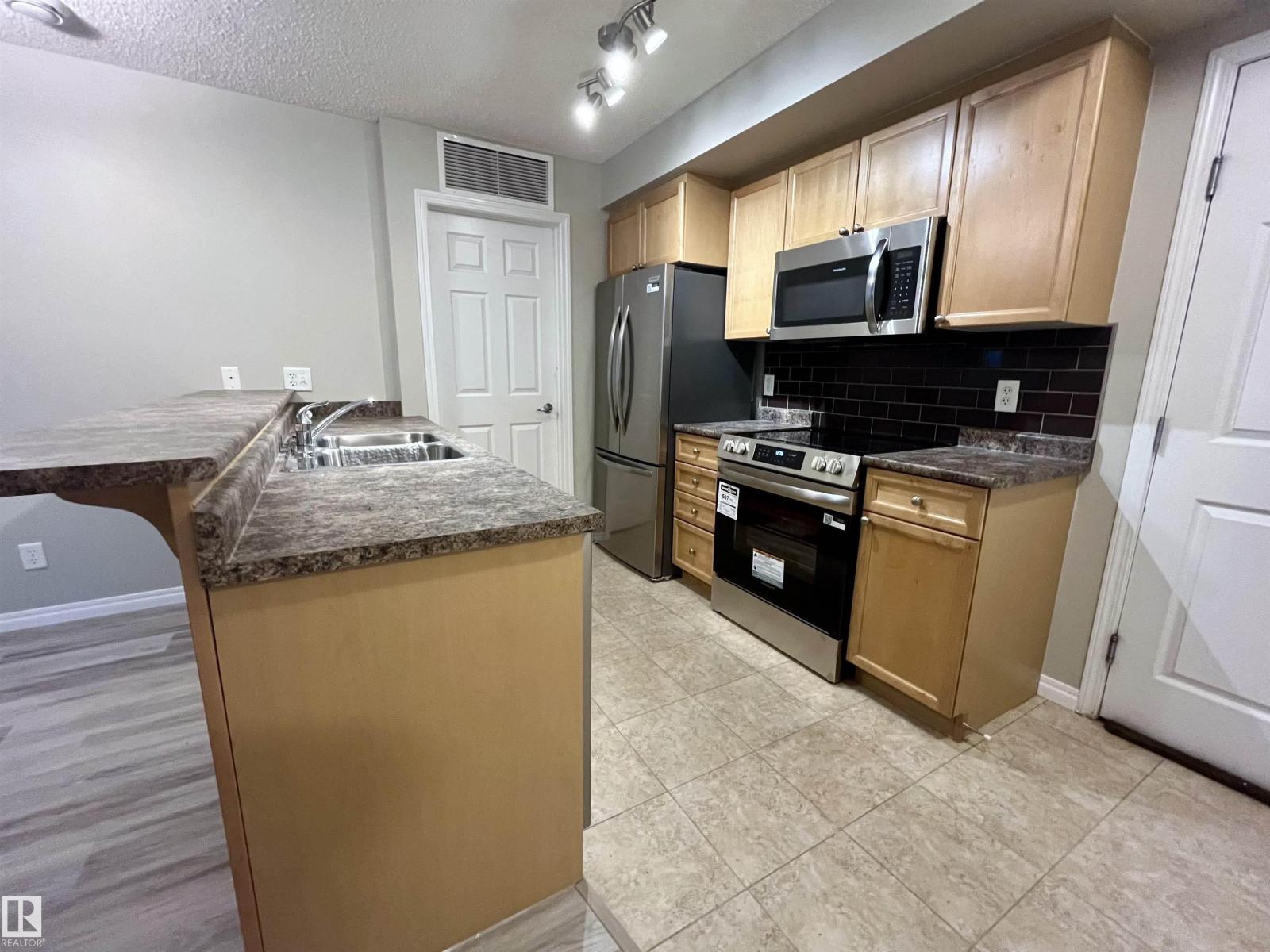 #102 6921 199 ST NW - 5