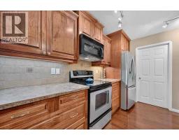 Family room - 177 Douglasview Rise Se, Calgary, AB T2Z2H8 Photo 13