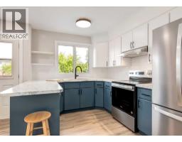 Family room - 7956 71 Avenue Nw, Calgary, AB T3B4J3 Photo 12
