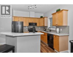 Living room - 103, 4718 Stanley Road Sw, Calgary, AB T2S2R2 Photo 7