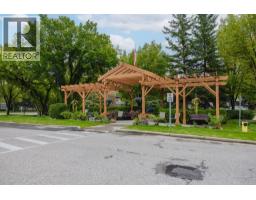 1306, 1306 Lake Fraser Court SE - photo 2