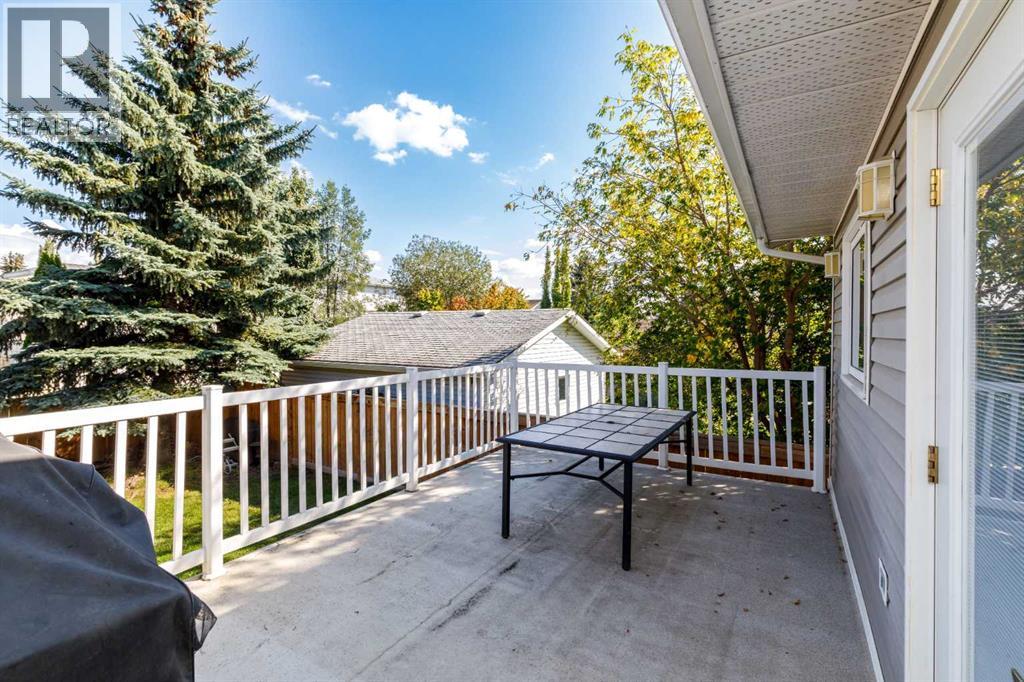 Listing photo – 49 Rutledge Crescent E, Red Deer