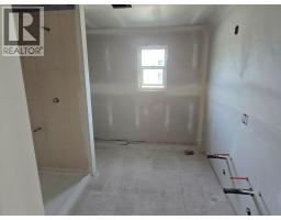 Living room - 209 12th Avenue Frontage Road, Genelle, BC V0G1G0 Photo 11
