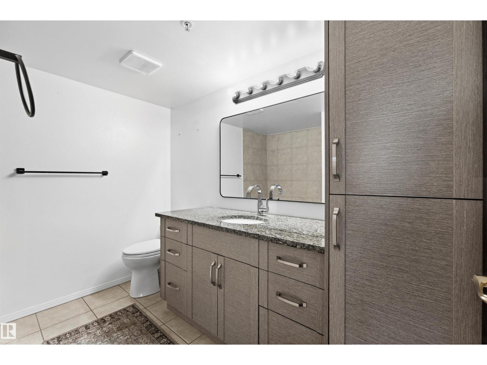#309 8909 100 ST NW - 18