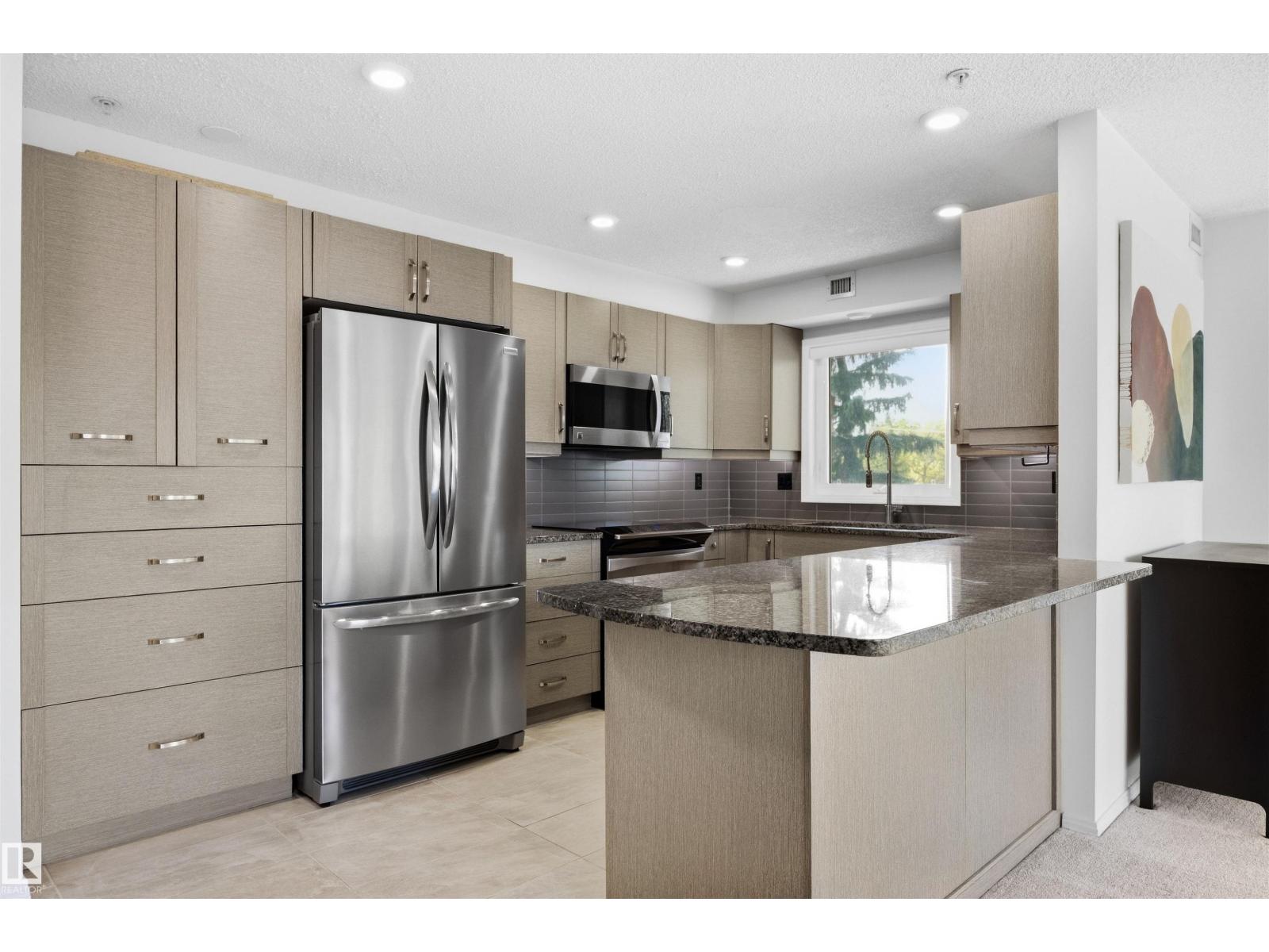 #309 8909 100 ST NW - 4