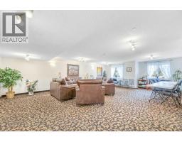 Living room - 2202, 928 Arbour Lake Road Nw, Calgary, AB T3G5T2 Photo 6