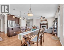 Family room - 21 Mount Rae Heights, Okotoks, AB T1S0M6 Photo 9