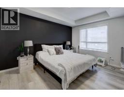 Bedroom - 106, 360 Harvest Hills Way Ne, Calgary, AB T3K2S1 Photo 10