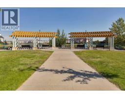 106, 360 Harvest Hills Way Ne, Calgary, AB T3K2S1 Photo 25