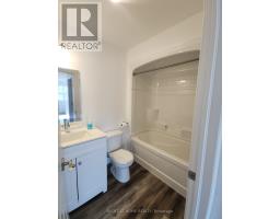 205 - 9 Queen Street W, Springwater, ON L0L1P0 Photo 9