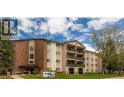 303, 85 Foxbend Crescent N - photo 1