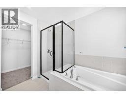 79 Creekside Rise Sw, Calgary, AB T2X6G8 Photo 32