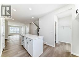 Laundry room - 15 Heirloom Lane Se, Calgary, AB T3S0Y2 Photo 17