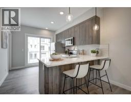 Bedroom - 212 Shawnee Square Sw, Calgary, AB T2Y0T7 Photo 11