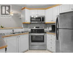 Primary Bedroom - 101, 7724 Bowness Road Nw, Calgary, AB T3B0H1 Photo 6