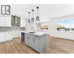 Laundry room - 18 Osprey Hill Bay Sw, Calgary, AB T3B6S2 Photo 13