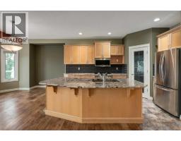 184 Sunterra Heights, Cochrane, AB T4C1W7 Photo 13
