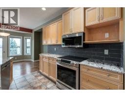 184 Sunterra Heights, Cochrane, AB T4C1W7 Photo 14
