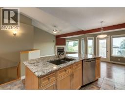 184 Sunterra Heights, Cochrane, AB T4C1W7 Photo 16