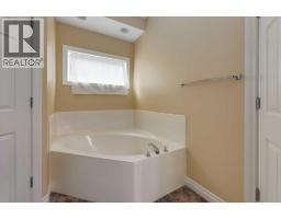 184 Sunterra Heights, Cochrane, AB T4C1W7 Photo 27