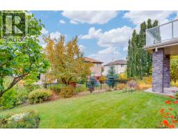 184 Sunterra Heights, Cochrane, AB T4C1W7 Photo 41