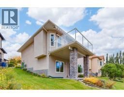 184 Sunterra Heights, Cochrane, AB T4C1W7 Photo 42