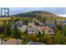 184 Sunterra Heights, Cochrane, AB T4C1W7 Photo 45