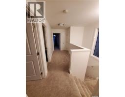 Living room - 447 Eaton Lane, Saskatoon, SK S7V0H5 Photo 12