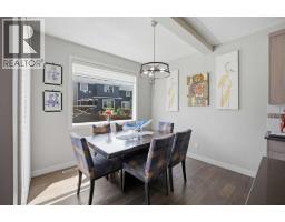 Family room - 52 Sunrise Way, Cochrane, AB T4C2S3 Photo 12